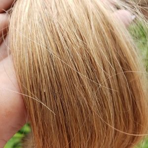 Bnwt golden blonde human hair bundle. 18 in